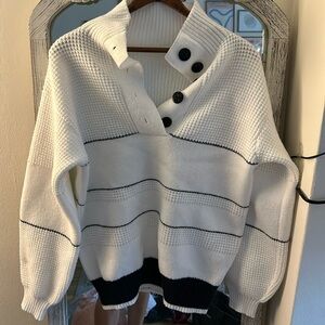 White and blue striped sweater